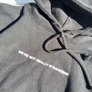 Black We’re not really Strangers Graphic Hoodie